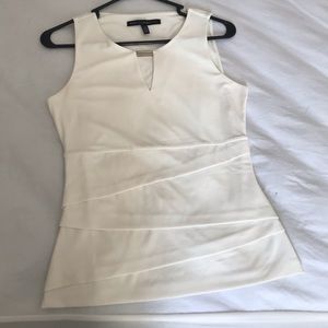 White sleeveless blouse